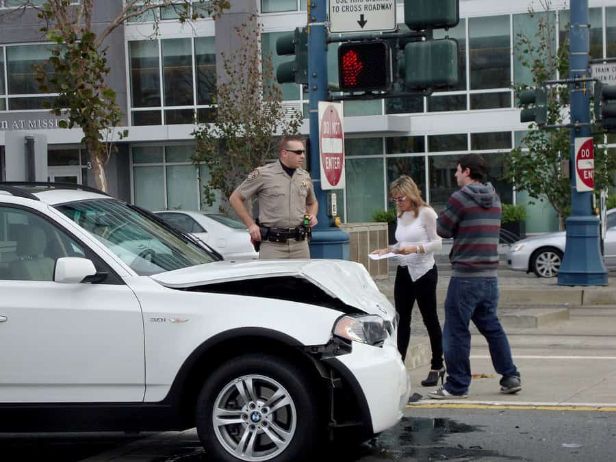 Is it OK to talk to the police at the scene of the accident?