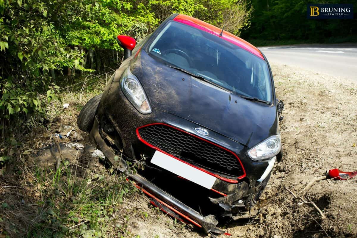 Damaged car after a collision illustrating no-fault car accident insurance claims